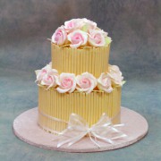 Chocolate Stick Fence Wedding Cake with Pink Roses