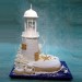 Lighthouse And Dolphins Wedding Cake