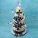 White Chocolate Fence Wedding Cake with Purple Roses And Butterflies