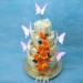 White Chocolate Fence Wedding Cake with Orange Roses And Butterflies