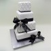 4 T Quilt And Black Ribbon Cake